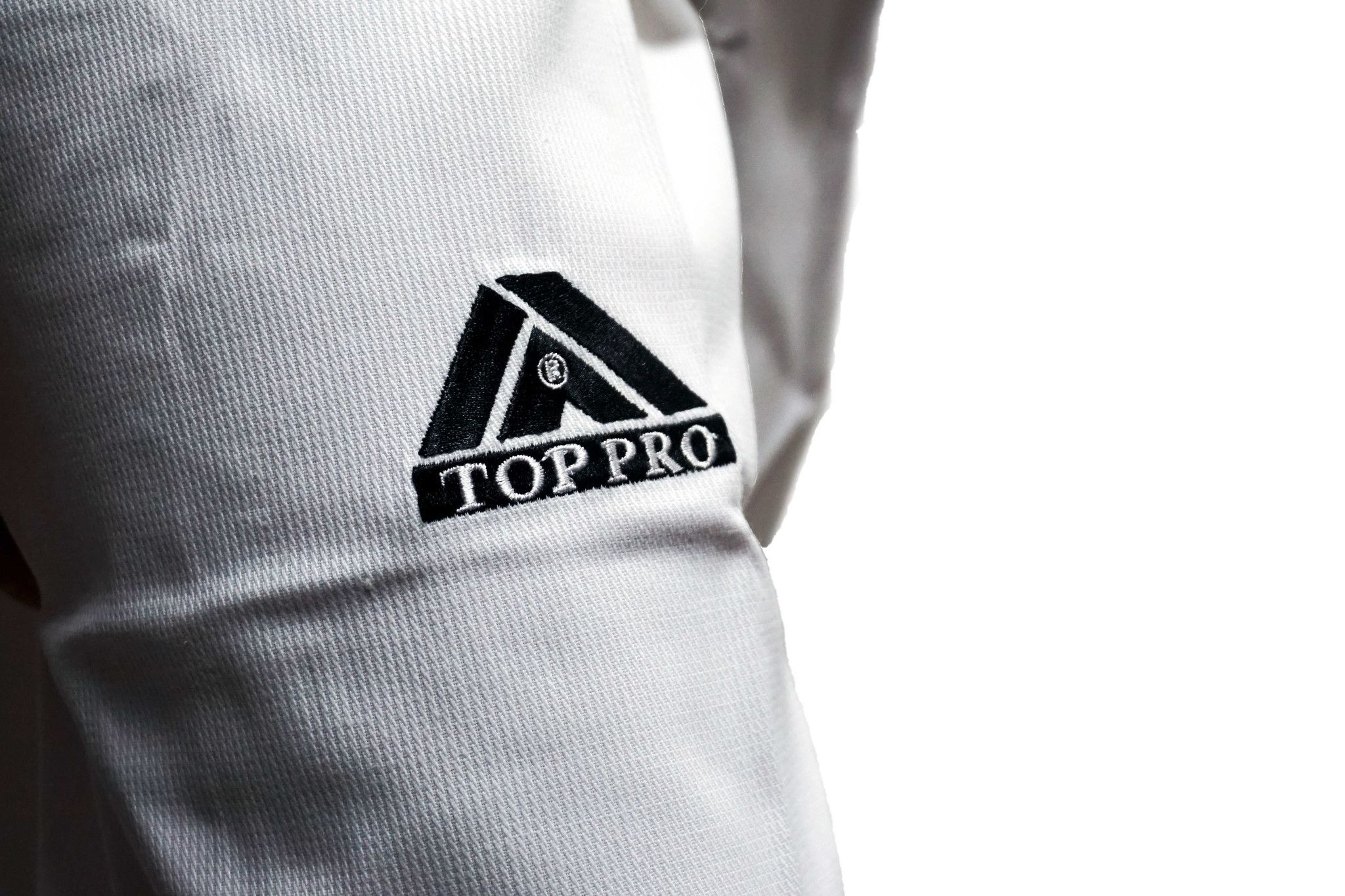 Top Pro - Dobok per Taekwondo Top Combat collo bianco con Ricamo su schiena