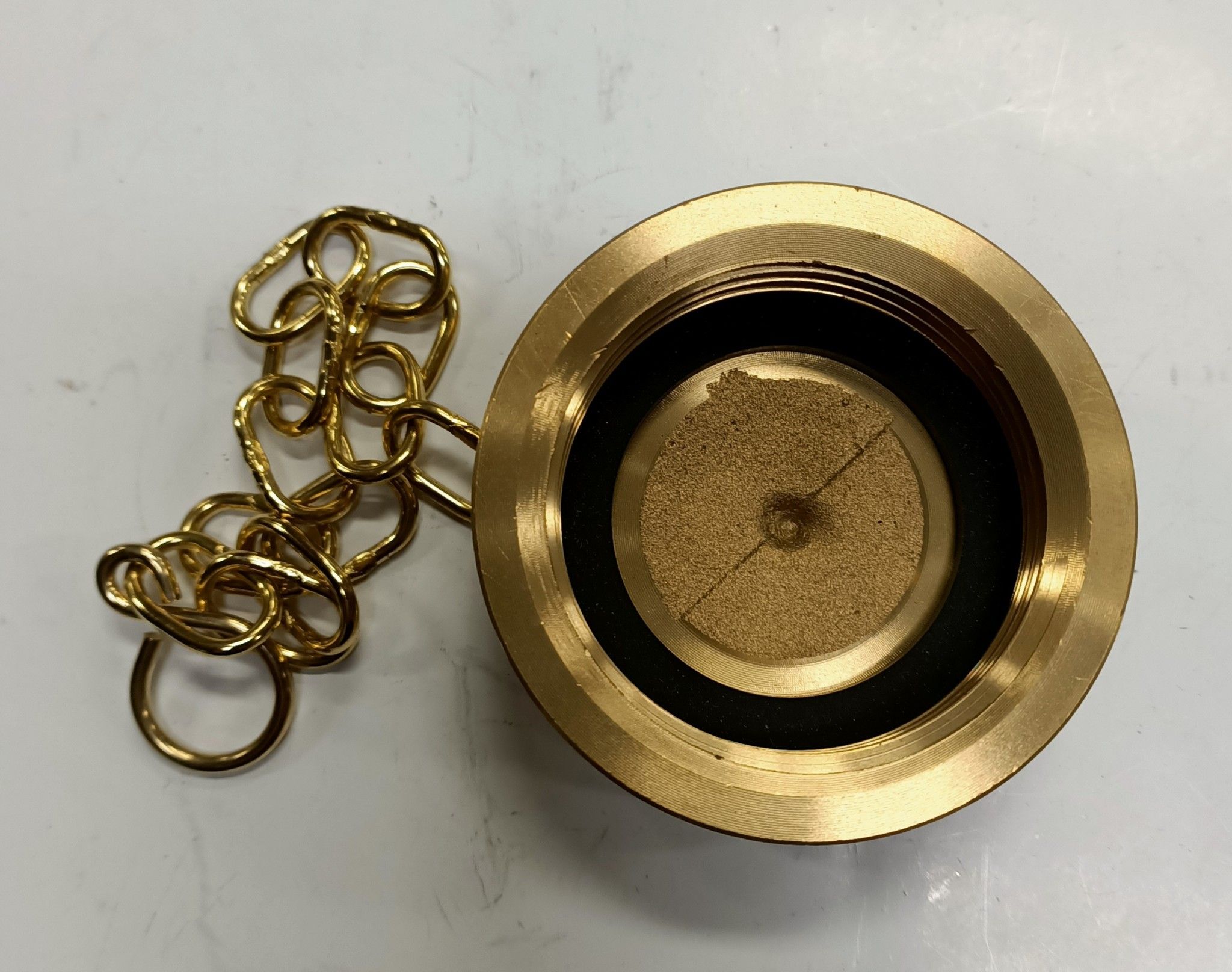 Tappo femmina filetto UNI 45 con catenella