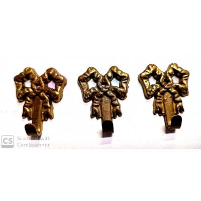 Attaccaglia mod. FIOCCO in ottone lucido