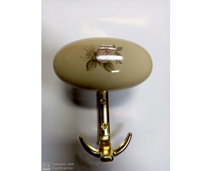 Appendiabito in metallo laccato bianco con fiore