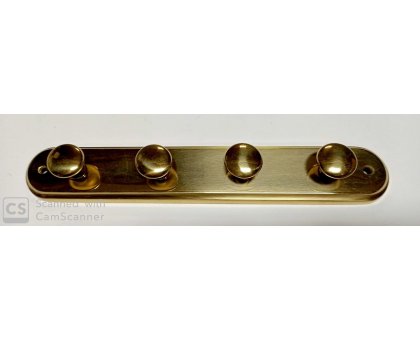 Appendino a parete 4 pomoli in ottone lucido