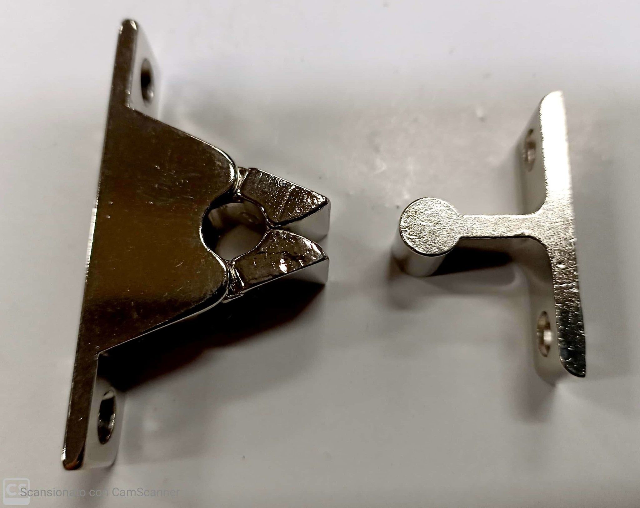 Pinzetta bloccaporta in zama cromato