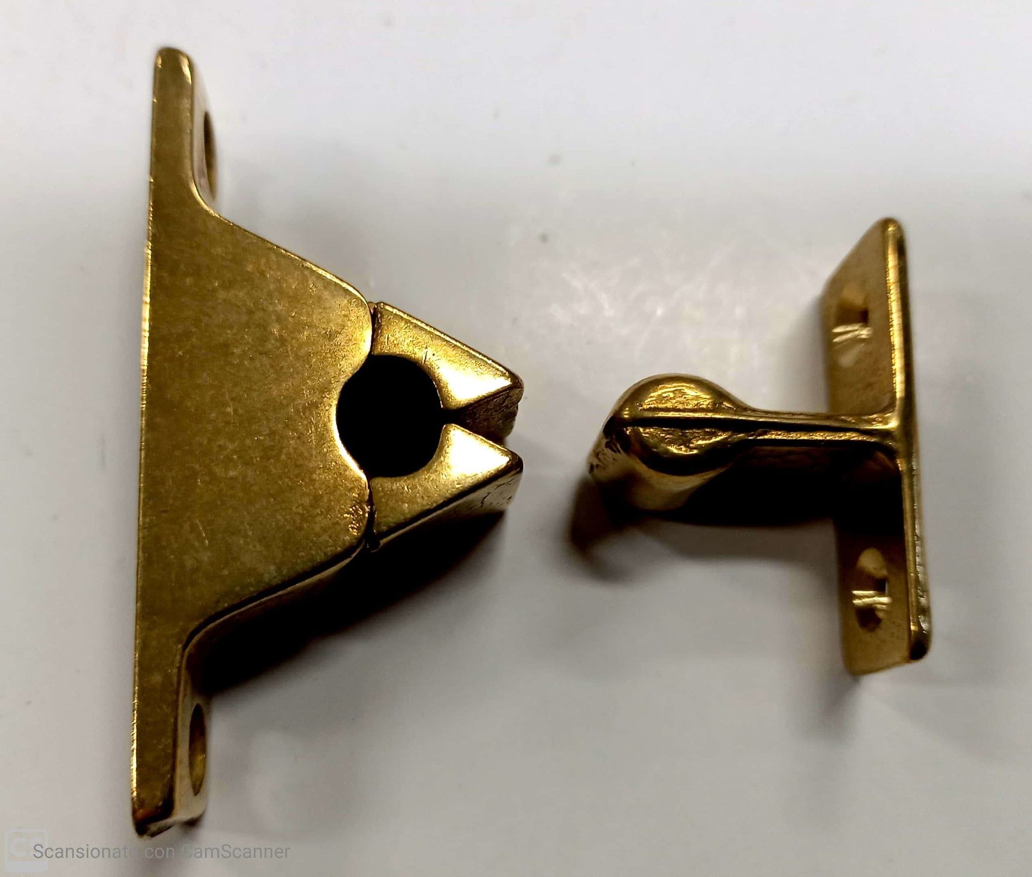 Pinzetta bloccaporta in ottone lucido