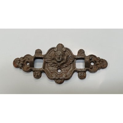 Antico fregio con stilizzato volto di angelo in fusione di ghisa