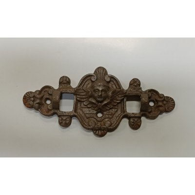 Antico fregio con stilizzato volto di angelo in fusione di ghisa