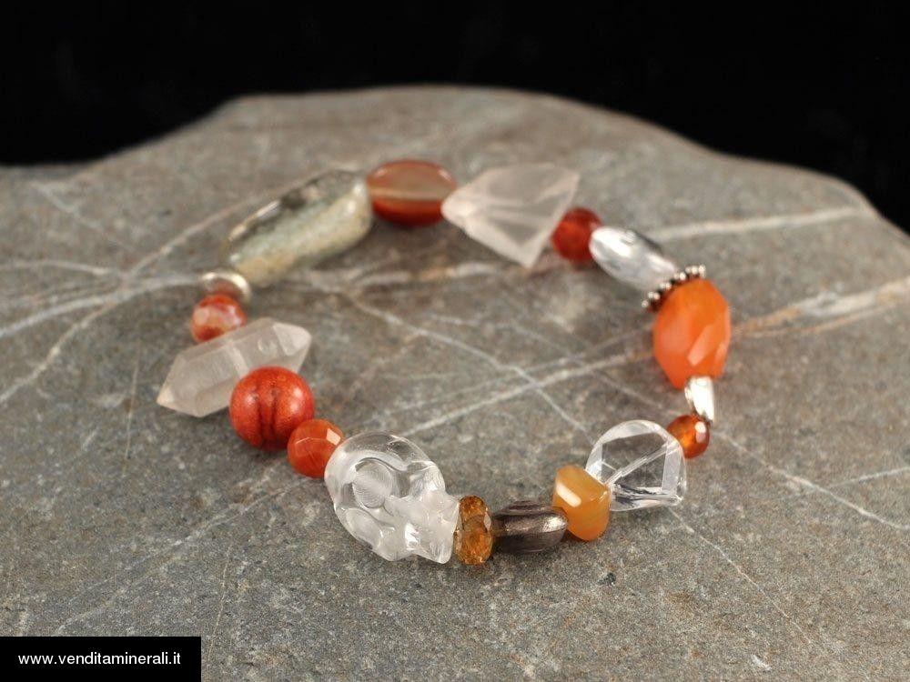 Cristallo di rocca con corallo e corniola