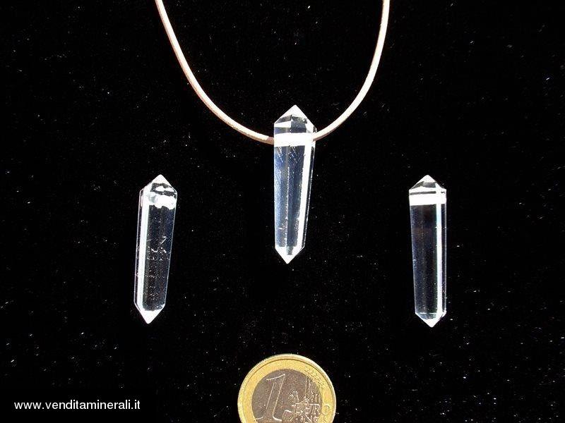 Doppia estremita' in cristallo di rocca con alesaggio