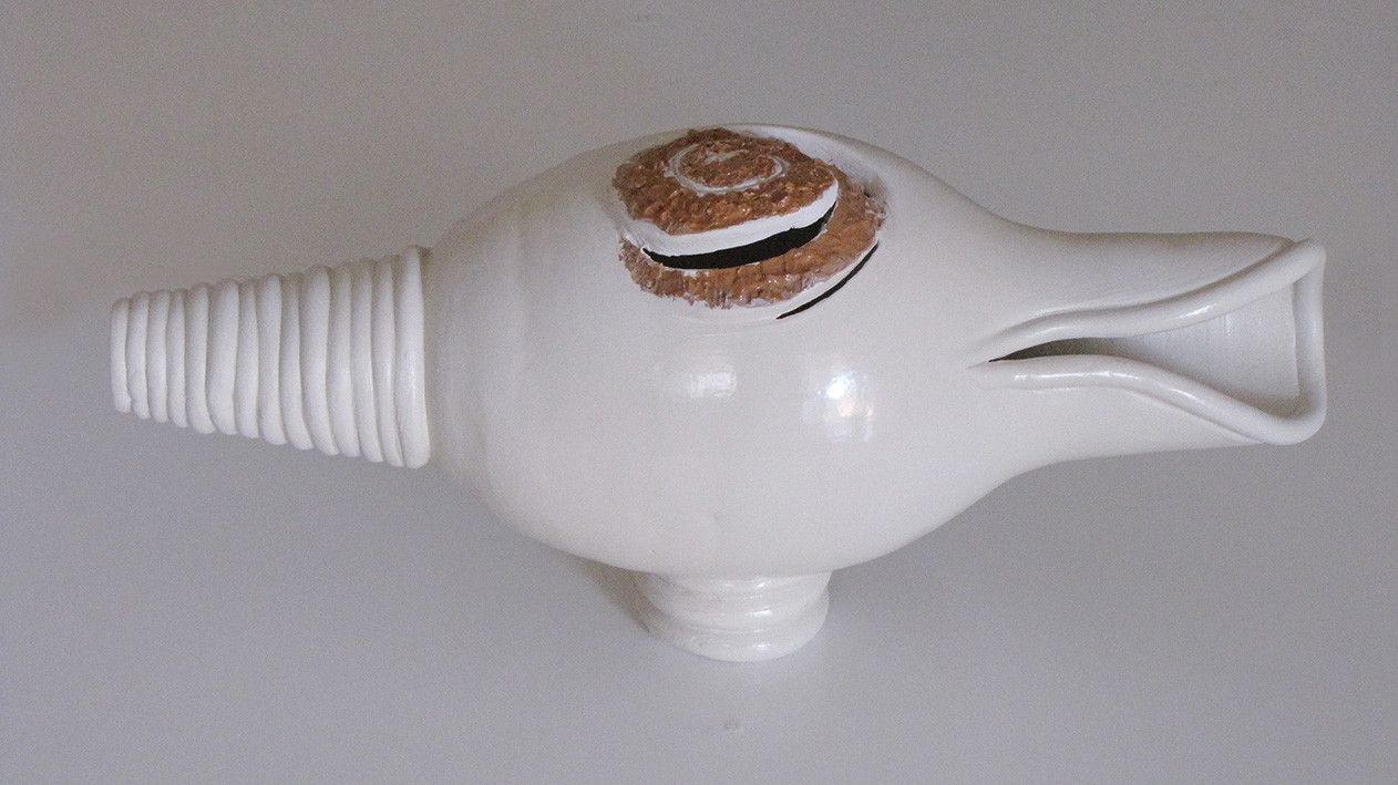 SCULTURA IN CERAMICA  LUCIANA PEREGO ' CARACOLES '  dimensioni L 45 x H 20 cm.