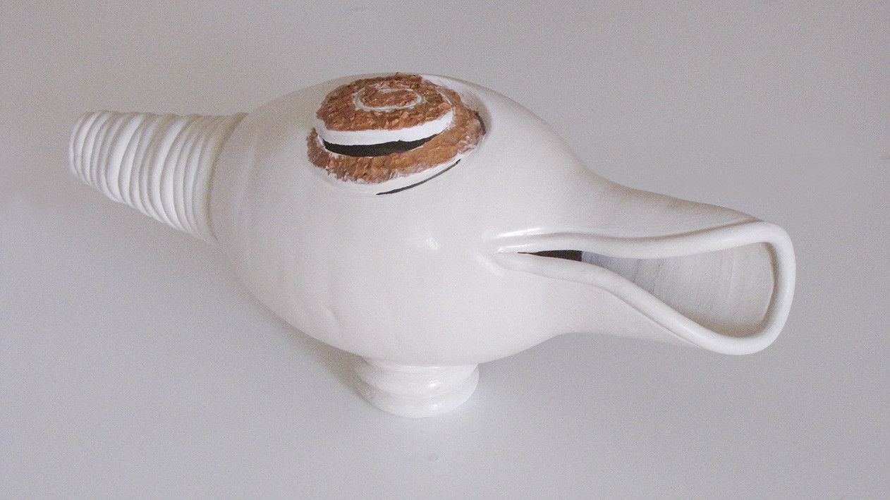 SCULTURA IN CERAMICA  LUCIANA PEREGO ' CARACOLES '  dimensioni L 45 x H 20 cm.