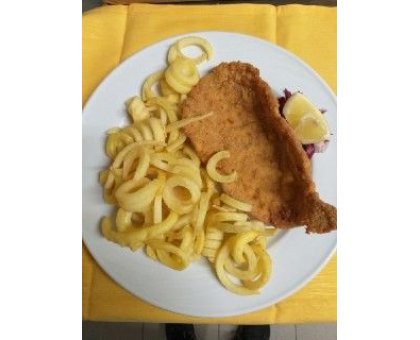 Piatto unico Cotoletta di vitello con patatine twister e bibita compresa servita al tavolo