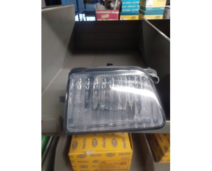 FENDINEBBIA DESTRO VW GOLF 1983-> COD. HELLA 1NL006315061