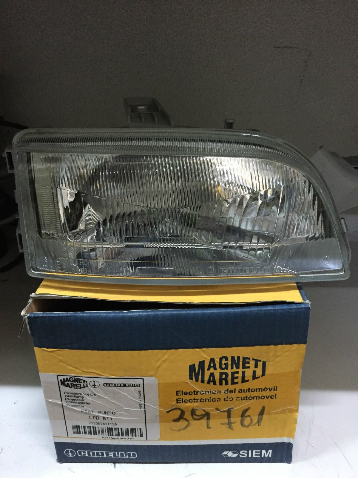 FARO DX  H4 C.CORR.ASS.FIAT PUNTO 93-> COD.MARELLI 712397611129